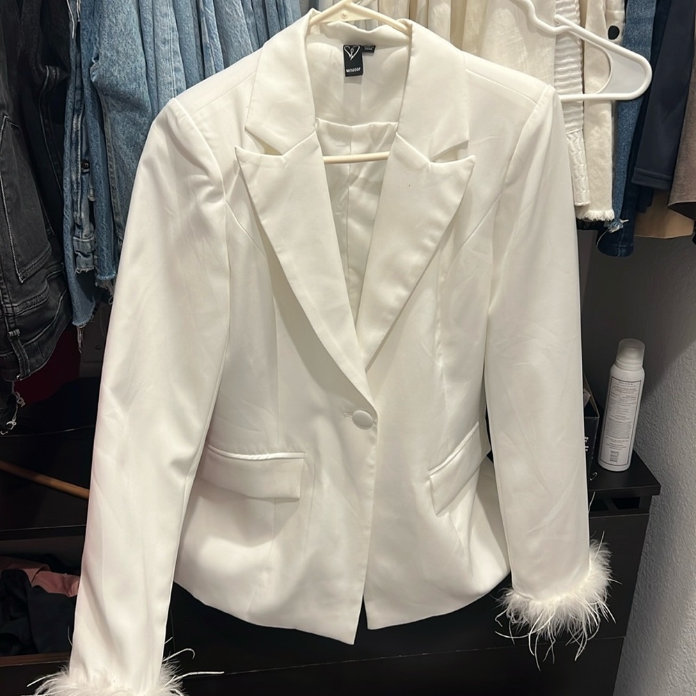 White blazer with fur sleeves